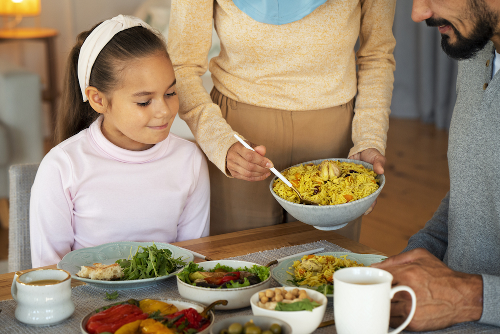 high-angle-islamic-family-with-delicious-food